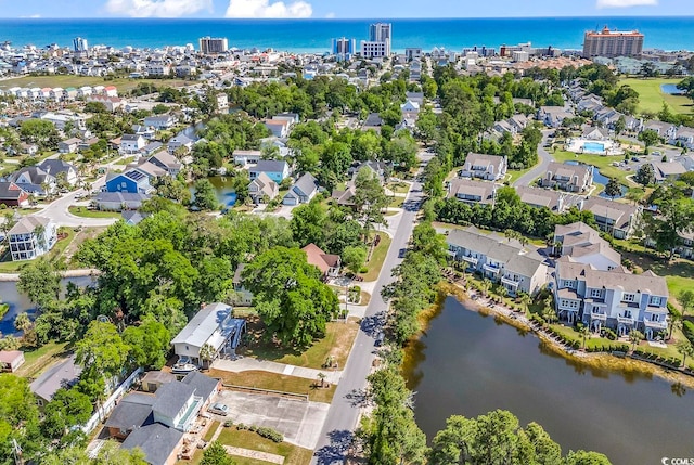 drone / aerial view with a water view