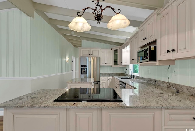 kitchen with decorative light fixtures, stainless steel appliances, lofted ceiling with beams, white cabinetry, and sink