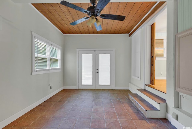 interior space featuring wood ceiling, french doors, ceiling fan, and tile floors