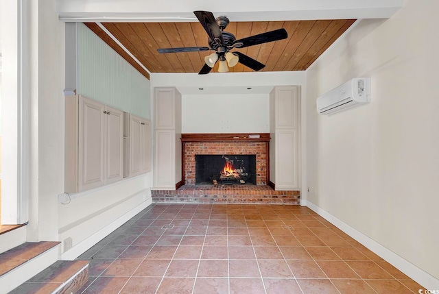 unfurnished living room featuring wooden ceiling, a fireplace, a wall unit AC, and tile flooring