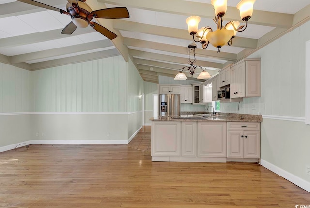 kitchen with white cabinets, light wood-type flooring, ceiling fan with notable chandelier, stone counters, and stainless steel appliances