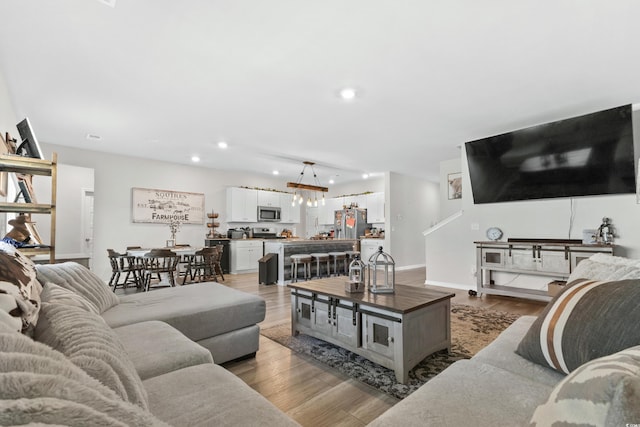 living room with hardwood / wood-style flooring