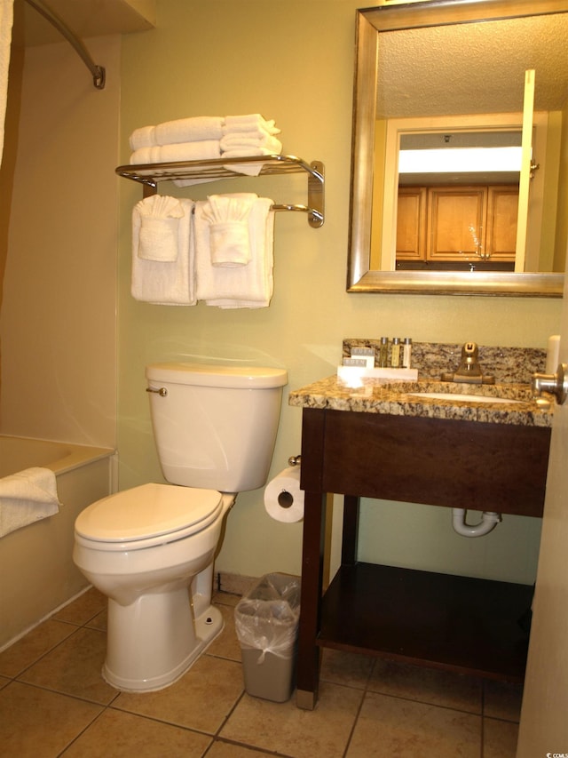 full bathroom with sink, toilet, tile flooring, and bathing tub / shower combination