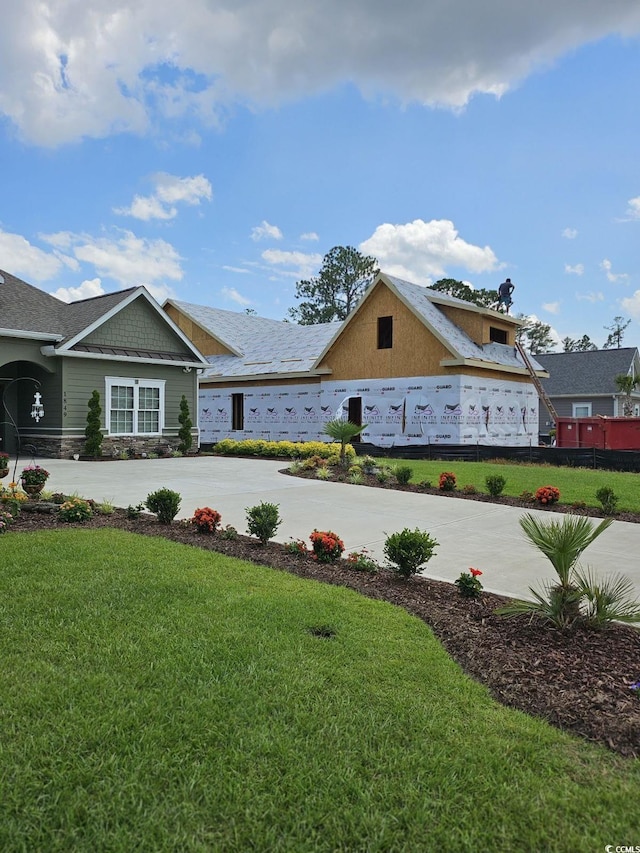 view of home's exterior featuring a yard