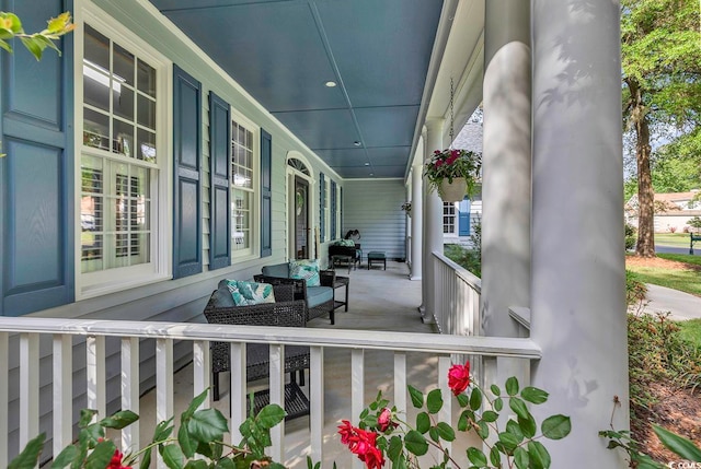 view of patio featuring a porch