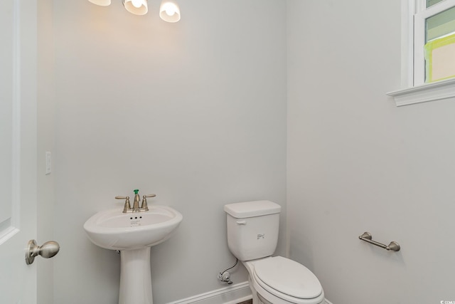 bathroom featuring toilet