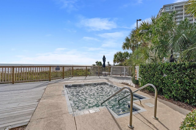 view of swimming pool featuring a deck