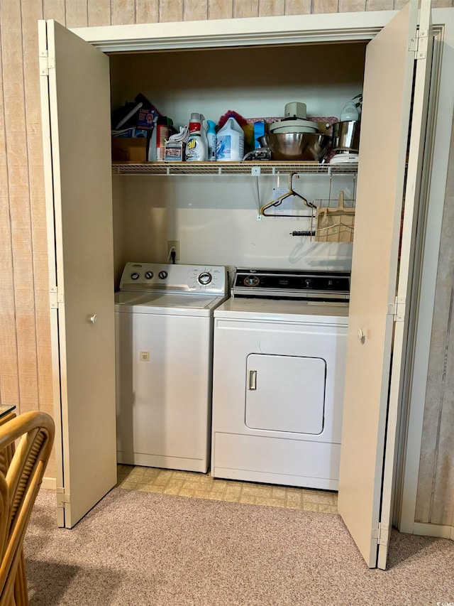 laundry room featuring light colored carpet and independent washer and dryer