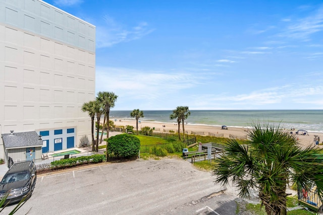 property view of water featuring a beach view