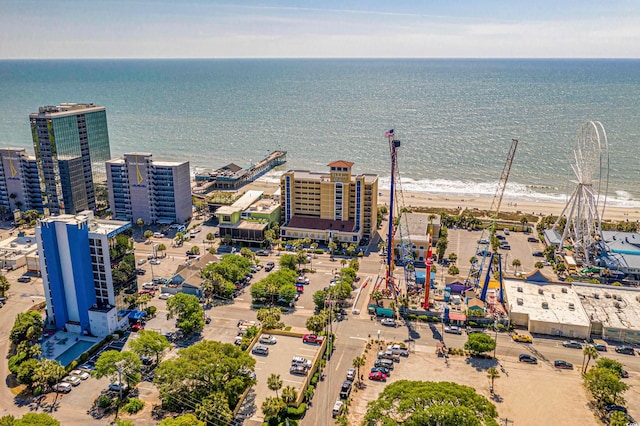 aerial view featuring a water view and a beach view