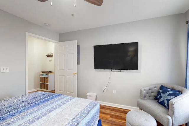 bedroom with ceiling fan and wood-type flooring