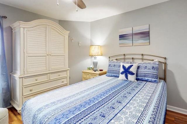 bedroom featuring ceiling fan and wood-type flooring