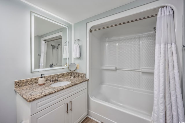 bathroom featuring shower / tub combo with curtain and oversized vanity