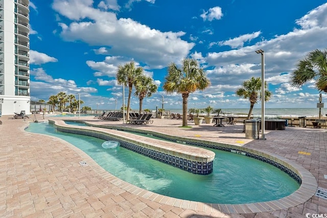 view of pool with a patio area