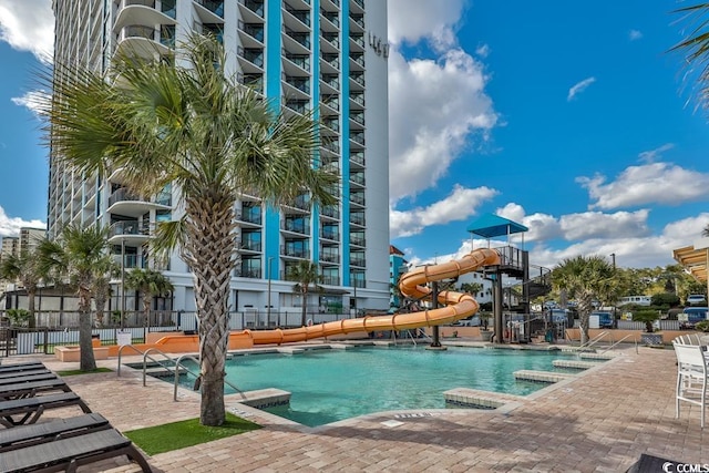 view of pool featuring a water slide