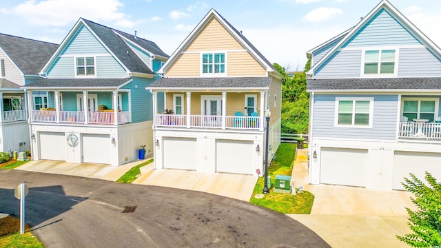 view of front of home featuring a garage and a porch