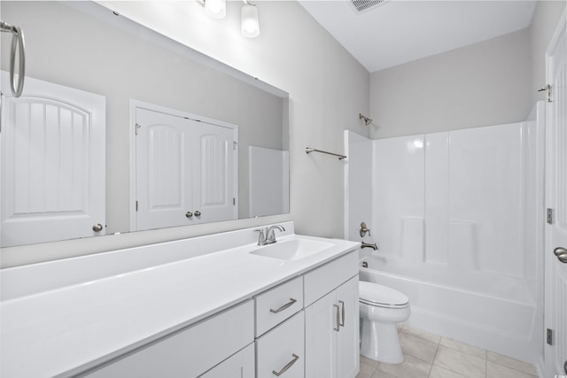 full bathroom featuring tile patterned flooring, vanity, toilet, and tub / shower combination