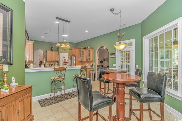 dining room featuring light tile patterned floors