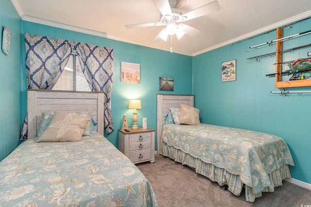 bedroom featuring carpet flooring, ornamental molding, ceiling fan, and a textured ceiling