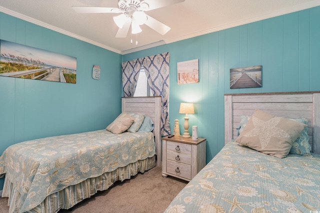 bedroom with ornamental molding, carpet flooring, and ceiling fan