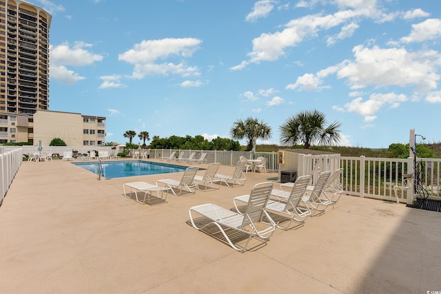 view of pool with a patio