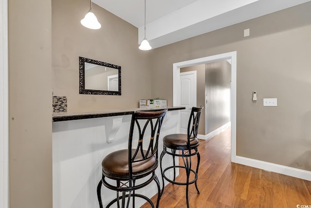 dining area featuring wood-type flooring