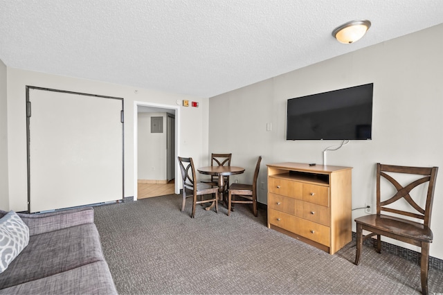 interior space with a textured ceiling