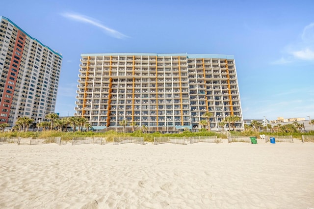 view of property featuring a view of the beach