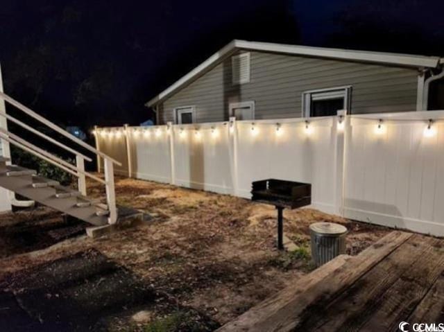 view of yard at night