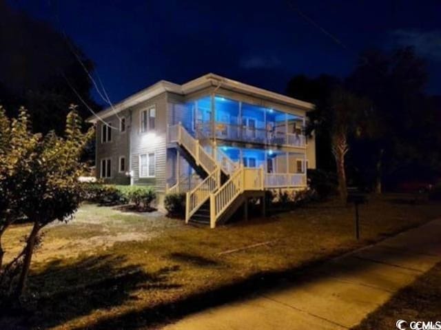 view of back house at night