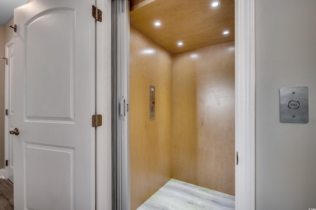 bathroom with vanity, toilet, visible vents, and a stall shower