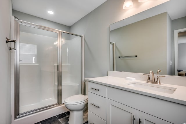 unfurnished room with baseboards, a ceiling fan, dark wood-style flooring, and visible vents