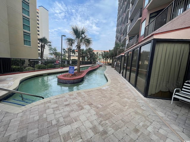 view of pool with a patio