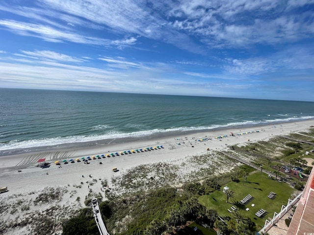 bird's eye view with a water view and a view of the beach