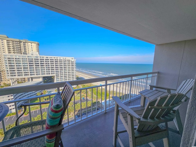 balcony featuring a water view