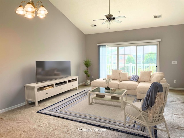 living room featuring high vaulted ceiling, ceiling fan with notable chandelier, and carpet flooring