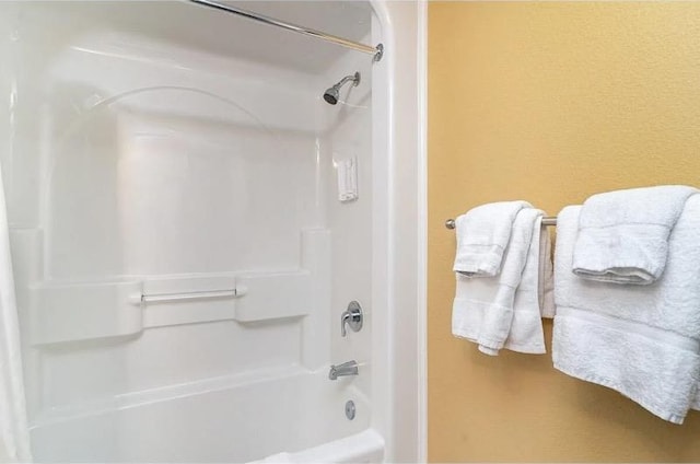 bathroom featuring bathing tub / shower combination