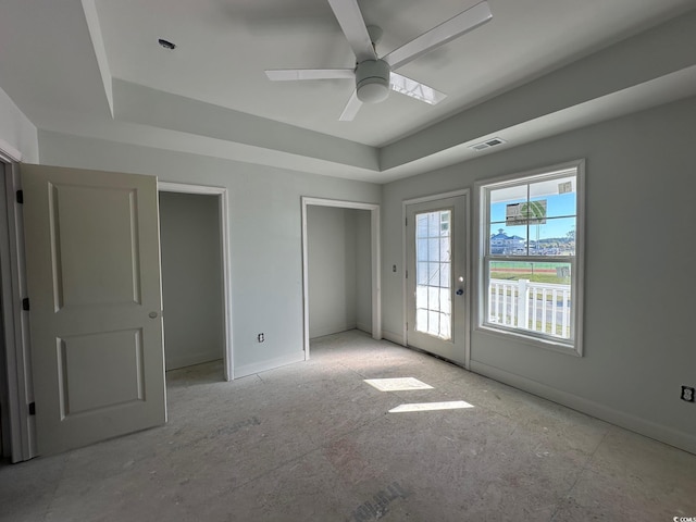 interior space featuring access to outside and ceiling fan