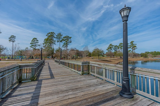 view of dock with a water view