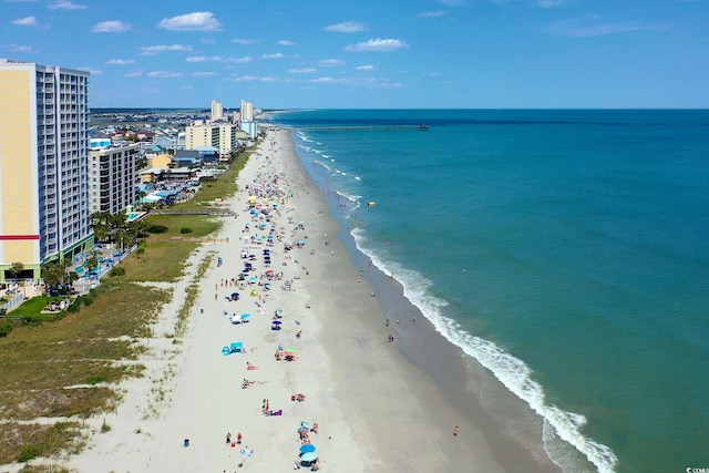 drone / aerial view with a view of the beach and a water view