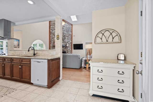 kitchen featuring a skylight, sink, white dishwasher, extractor fan, and black electric stovetop