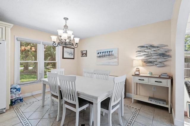 dining room featuring an inviting chandelier