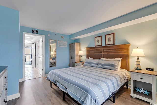 bedroom featuring hardwood / wood-style floors