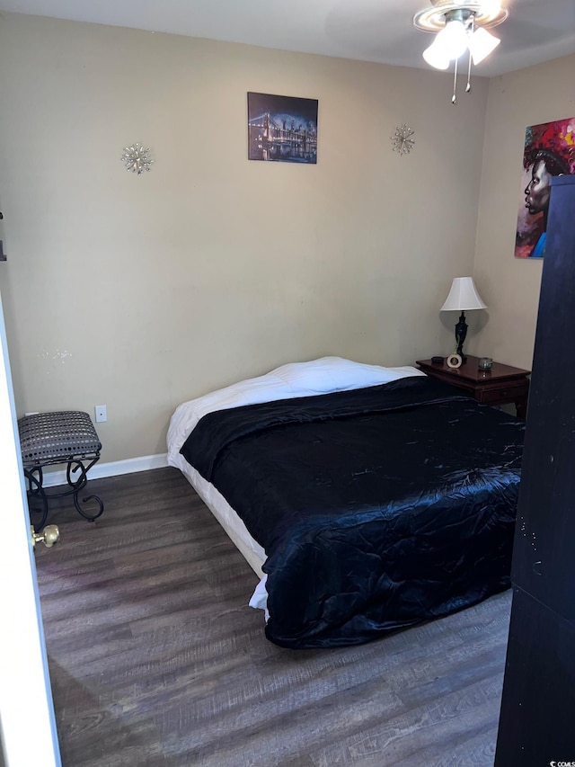 bedroom featuring hardwood / wood-style floors