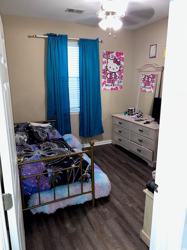 bedroom featuring dark hardwood / wood-style floors