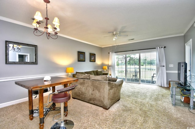 carpeted living room featuring ceiling fan with notable chandelier and crown molding