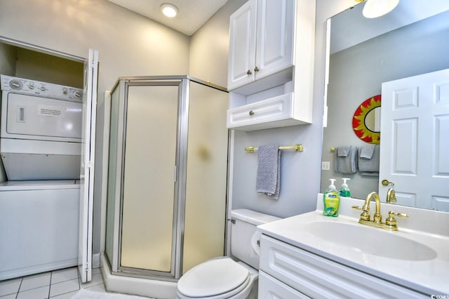 bathroom featuring walk in shower, tile flooring, vanity, and toilet