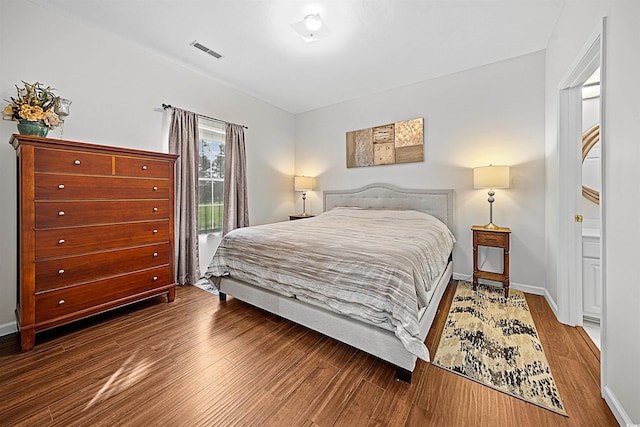 bedroom featuring hardwood / wood-style flooring