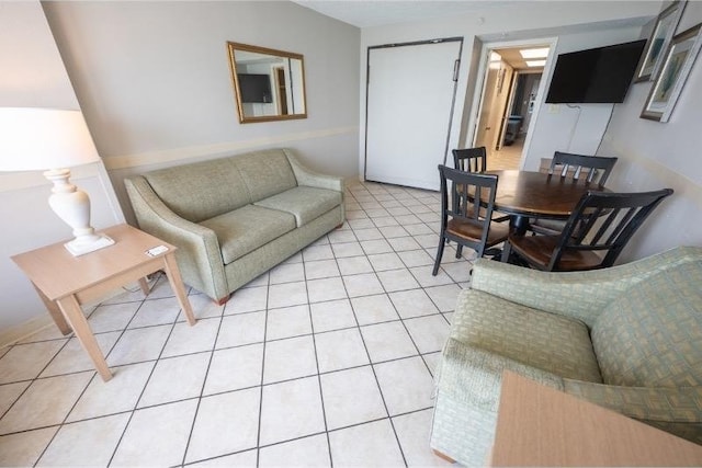 living room with tile patterned floors