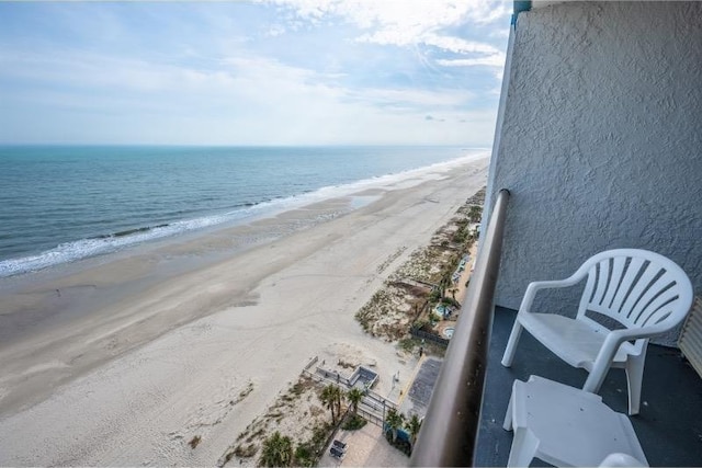 property view of water featuring a beach view